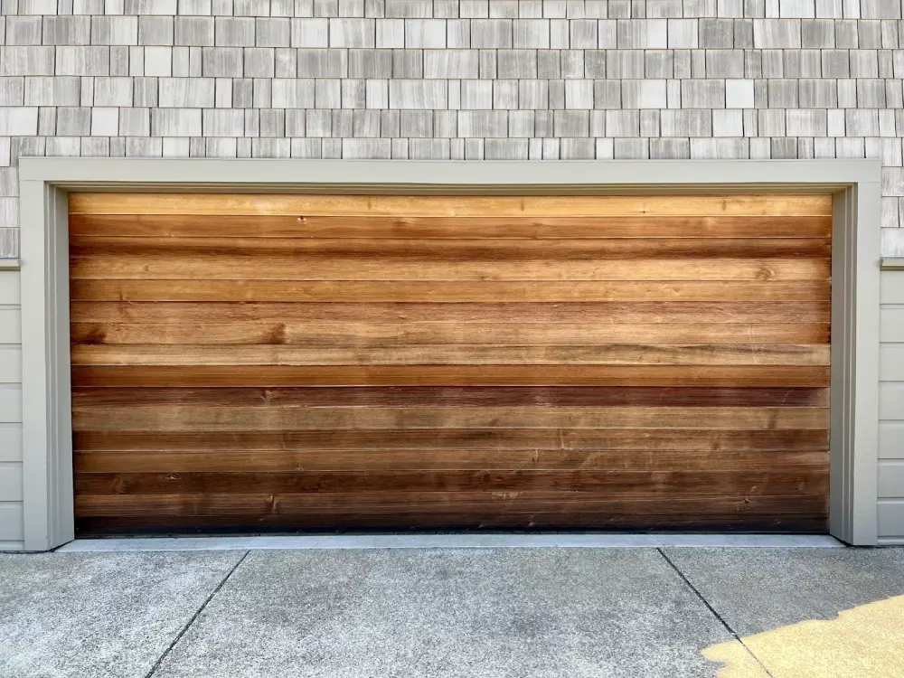 Garage door with wooden panels